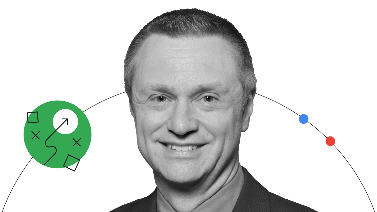 Professor e autor Jim Lecinski está sorrindo. Ele tem cabelo curto, olhos e pele claros, e usa um terno escuro com uma camisa de tom médio. Uma linha preta fina com três pontos em círculos verde, azul e vermelho circunda a foto.